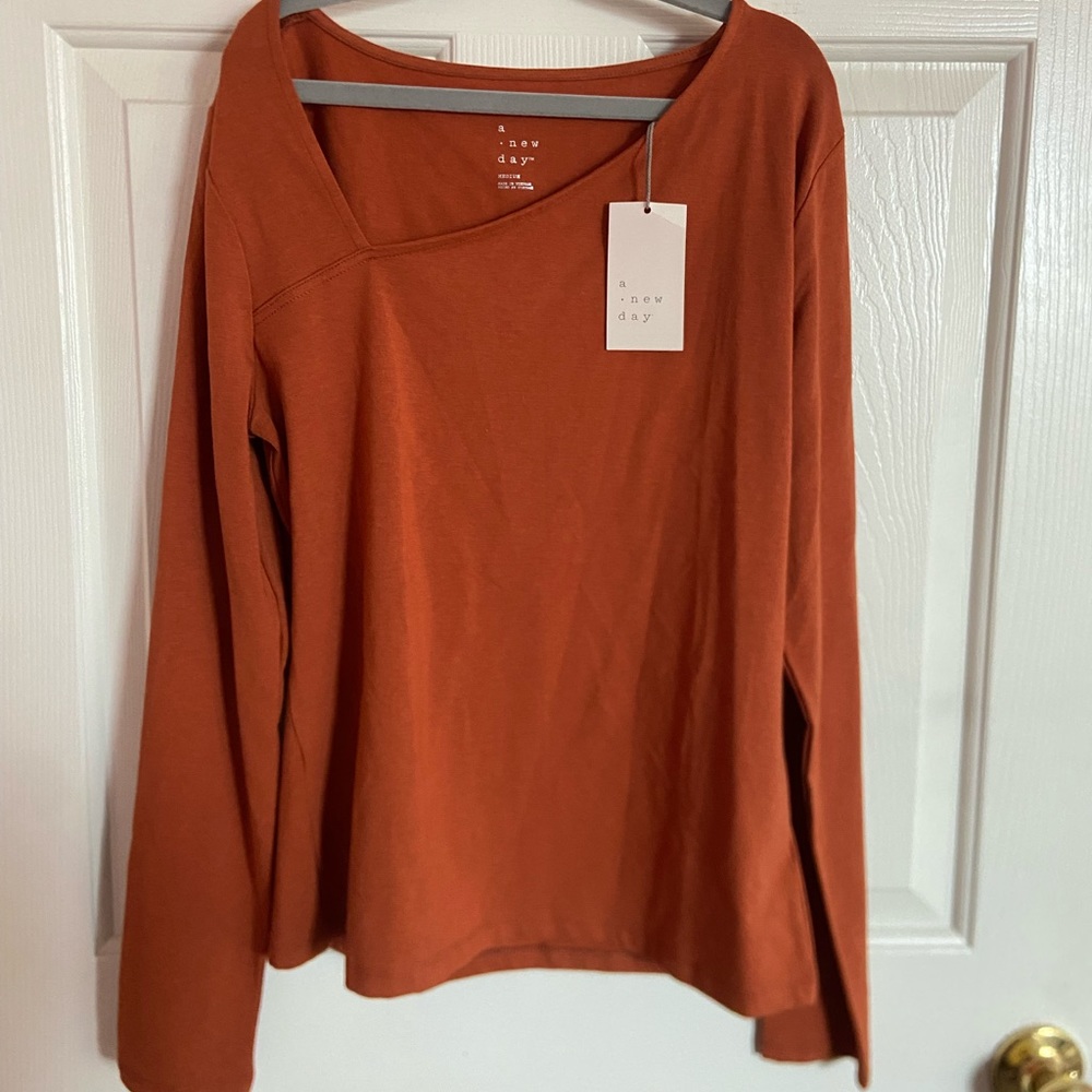 Asymmetrical long sleeve top